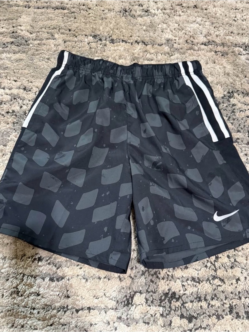Nike Black Athletic Shorts with Dark Gray Geometric Pattern and White Accents